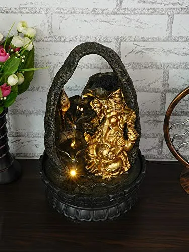 CRAFT SMITH Polyresin Chocolate Colour Ganesha Table Top Indoor Waterfall Fountain for Home Decor with LED Lights, Speed Controller Pump & Crystal Ball (Size: 25.5 x 21 x 18.5CM | Wt: 1145grm)