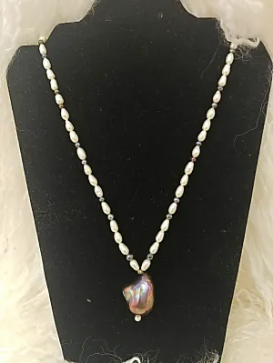 Fresh water pearl necklace with tourmaline stones