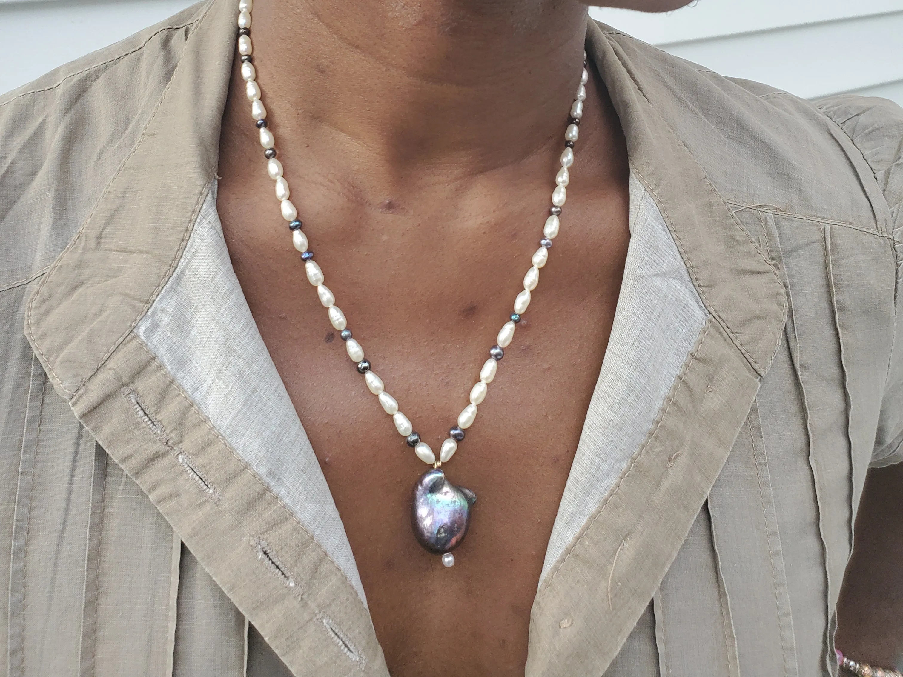 Fresh water pearl necklace with tourmaline stones