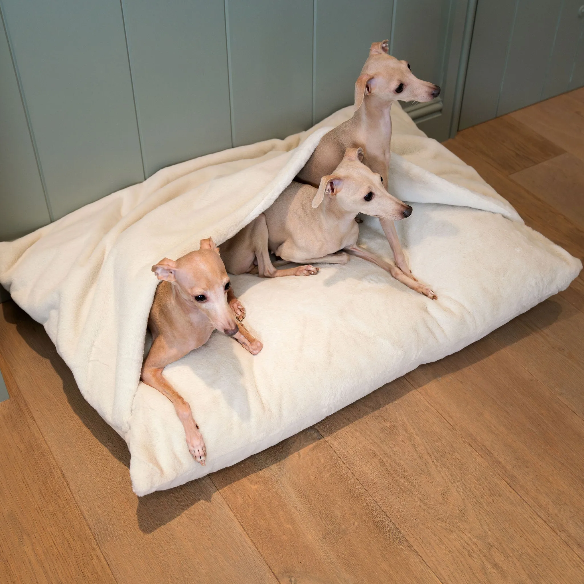 Sleepy Burrows Bed in Calming Anti-Anxiety Cream Faux Fur by Lords & Labradors